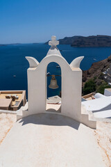 View of the Agean Sea from above a church in Oia, Santorini, Greece