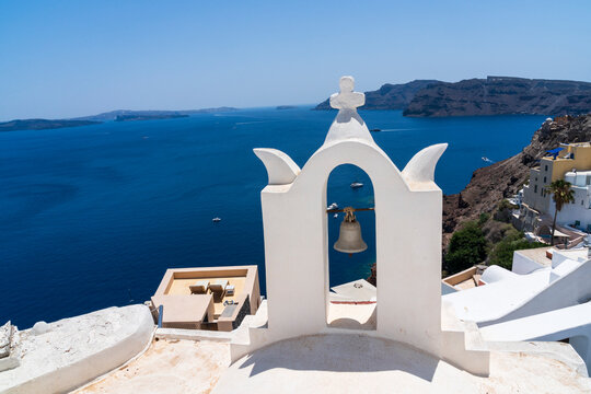 View of the Agean Sea from above a church in Oia, Santorini, Greece