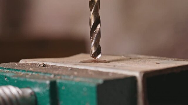 Industrial Metal Drilling in Slow Motion - Close Up