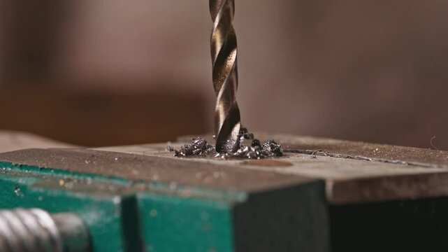 Industrial Metal Drilling in Slow Motion - Close Up