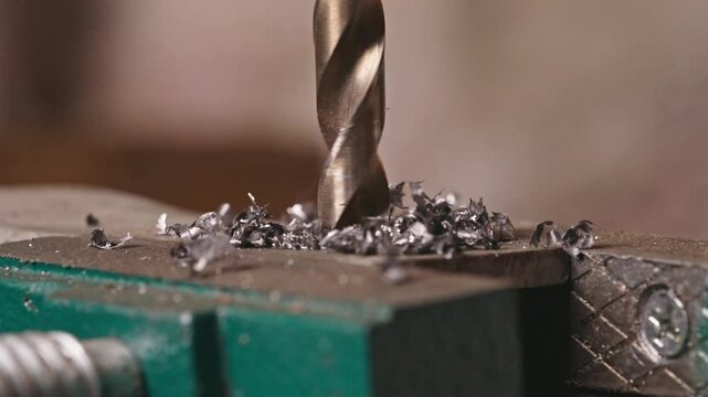 Industrial Metal Drilling in Slow Motion - Close Up