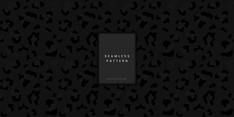 Wild seamless animal pattern featuring dark grey leopard or jaguar spots and panther print on black background for exotic fashion textile and luxury lifestyle branding © gegen