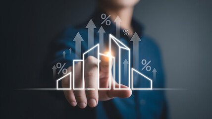 Businessman Pointing to Rising Financial Bar Chart with Interest Rate Percentage Icons and Upward Arrows for Growth.png