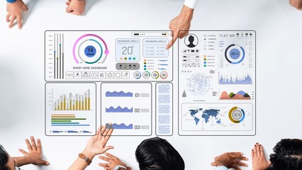 A diverse team collaborates around a smart home dashboard, analyzing data and insights to enhance user experience and optimize performance with engaging visuals. Raster