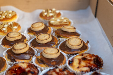 Fototapeta premium Chocolate cake in a street shop