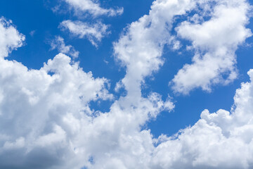 High-Resolution Clear Blue Sky with Soft White Clouds in Bright Daylight