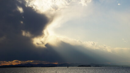 Sunbeams Breaking Through Clouds 