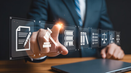 Online legal services and e-court concept with businessman touching virtual icons for law gavel and scales of justice.png