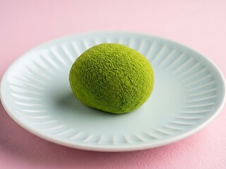 Green tea mochi on a white plate