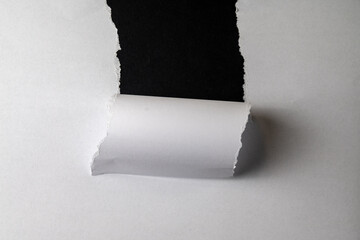Torn Paper Revealing Black Background