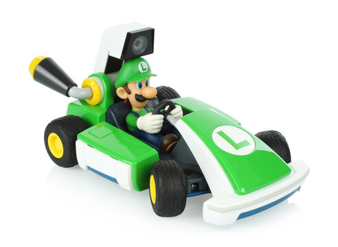 Mario Kart Live: Home Circuit is a Brand Mario Kart Game that combines Toys and Nintendo Switch with augmented reality. Toy Kart Luigi on transparent background with natural reflection and shadows
