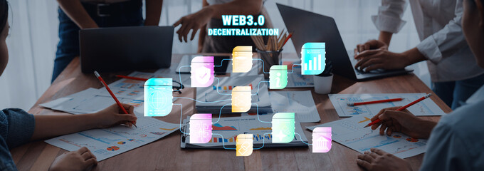 A dynamic business meeting showcasing teamwork and digital innovation focused on Web3.0 decentralization, featuring data visuals and modern technology in a professional setting. Trope