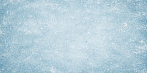 Obraz premium A bright blue grunge background features a frozen winter texture of ice and snow patterns on a cold frost surface resembling marble clouds and a vintage paper wall