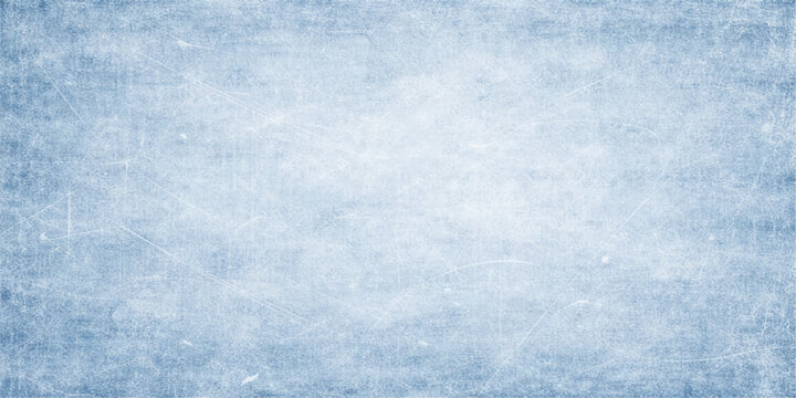 A bright blue grunge abstract background features a frozen winter texture of white snow and icy frost patterns under a cold crystal sky with soft clouds