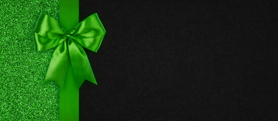 Green Gift Card with Ribbon Bow Top View with Copy Space