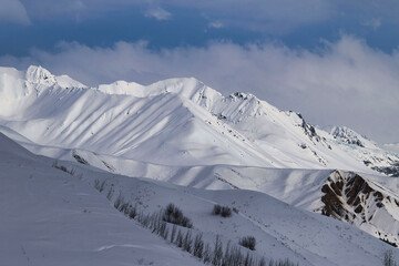 Sun shining on mountains on the Denali Highway in Alaska