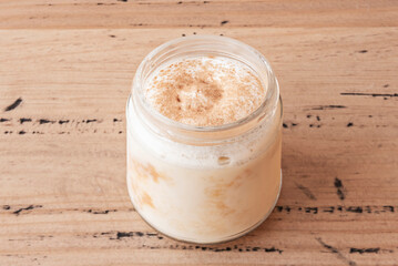 Traditional Tres Leches Cake with a sponge cake soaked in a mixture of evaporated milk, condensed...