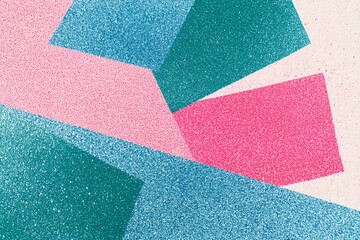 Fototapeta premium An abstract design featuring geometric shapes in vibrant colors like teal, pink, and light blue on a textured background.