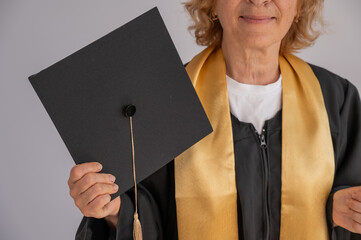 Old Woman with Graduation Hat. 
