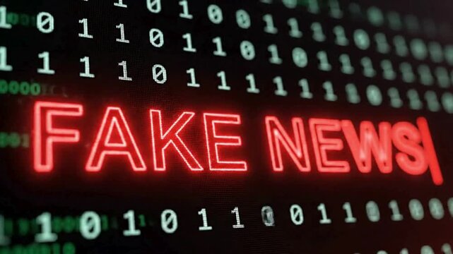 Red glowing "FAKE NEWS" text over a background of green binary code, symbolizing digital misinformation and propaganda.