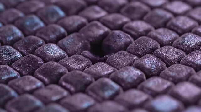 Closeup of a textured surface with a missing piece creating a unique pattern and abstract background.