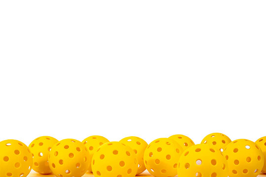 Yellow Pickleballs on white Background,  lot os room for text.