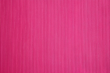 Obraz premium A Bright Pink Corduroy Style Fabric Background