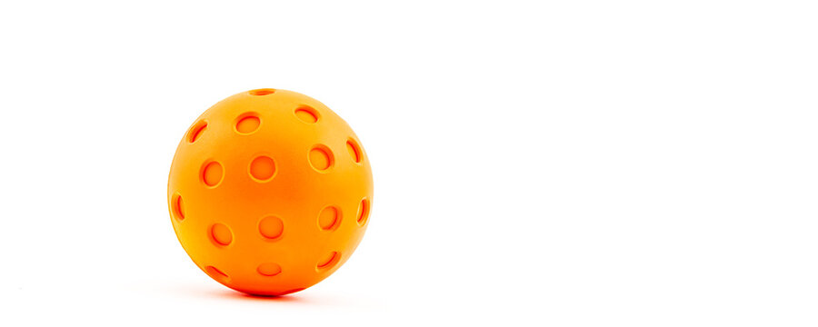 Orange Pickleball on a pure white background.