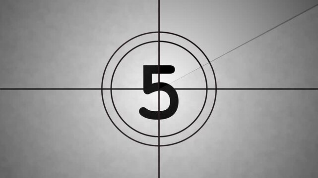 Vintage, old, projected film head leader with realtime countdown clock. Worn and damaged in style including marks, scratches and film grain to add a vintage look to your video. 4k video.