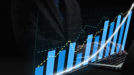 A businessman closely analyzes financial data on a laptop screen that displays upward-trending bar graphs and charts. The image captures the essence of success in the corporate world. Copula - Powered by Adobe