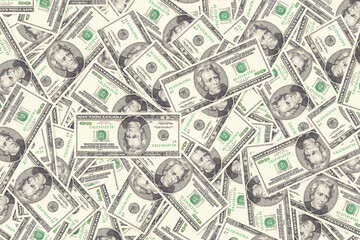 Background of scattered twenty US dollar bills money texture