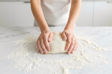 Kneading Dough on Floured Surface in Bright Kitchen.