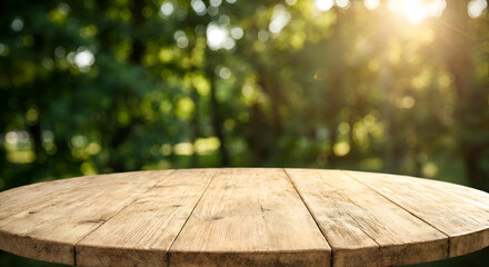 Empty Rustic Round Wooden Table Top in Sunny Green Nature Background. Perfect for Product Display or Outdoor Summer Template.