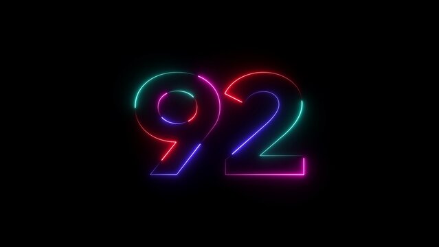 Neon numbers ninety two in pink blue and green on black background