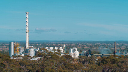 Aerial view of an oil refinery in a forest