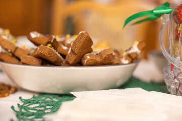 Plate with traditional Polish gingerbread cookies served during Christmas Eve celebration