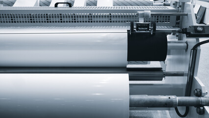 Large industrial automatic machine for cutting and gluing PVC film on wood chipboard and MDF boards...