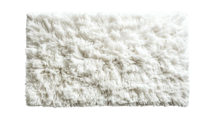 A textured, rectangular rug with long, fluffy, white fibers against a black background