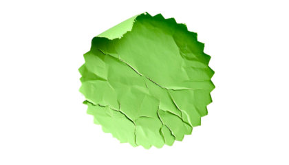 Isolated textured, round green paper, curled top edge, with a jagged outer edge on black background