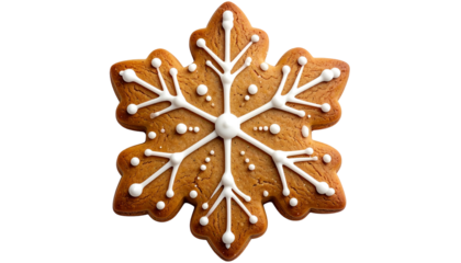 A close-up of a gingerbread cookie shaped like a snowflake with white icing details, black background