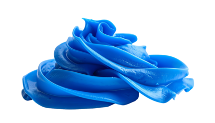 A swirl of vibrant blue frosting, textured and smooth against a black background