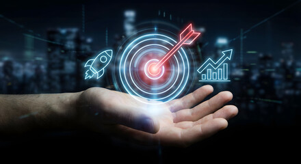 hand holding target with dart, business goals, success