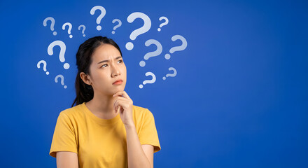 thinking woman with question marks around head