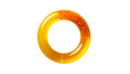 A translucent golden ring, filled with sparkling particles, set against a stark black backdrop