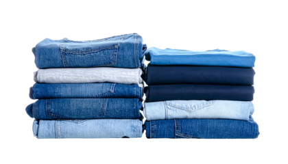 Stacks of folded denim clothing in various shades of blue against a transparent background