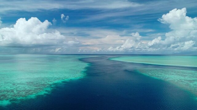Ascending aerial shot of remote Marine Conservation Area of Ebiil Channel in Palau.