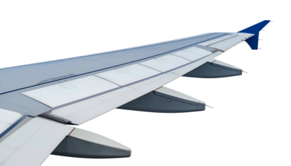 Close-up of an aircraft wing, showcasing flaps, ailerons, and wingtip. Black background
