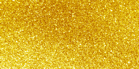 Golden yellow glitter light shiny texture background. New Year, Christmas, Wedding, Anniversary and Celebration background concept.