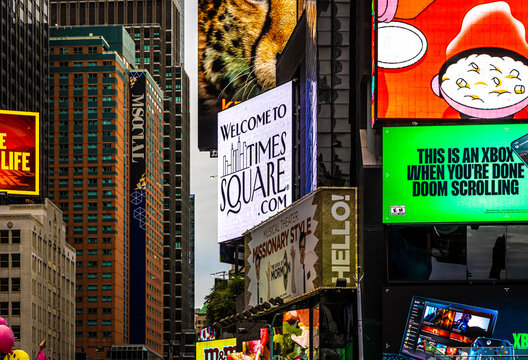 Times Square Manhattan New York City with bright LED billboards and busy street