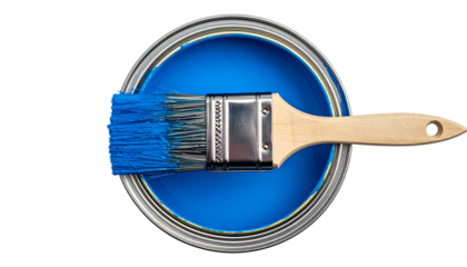 A top-down shot of a paint can filled with blue paint and a paintbrush resting